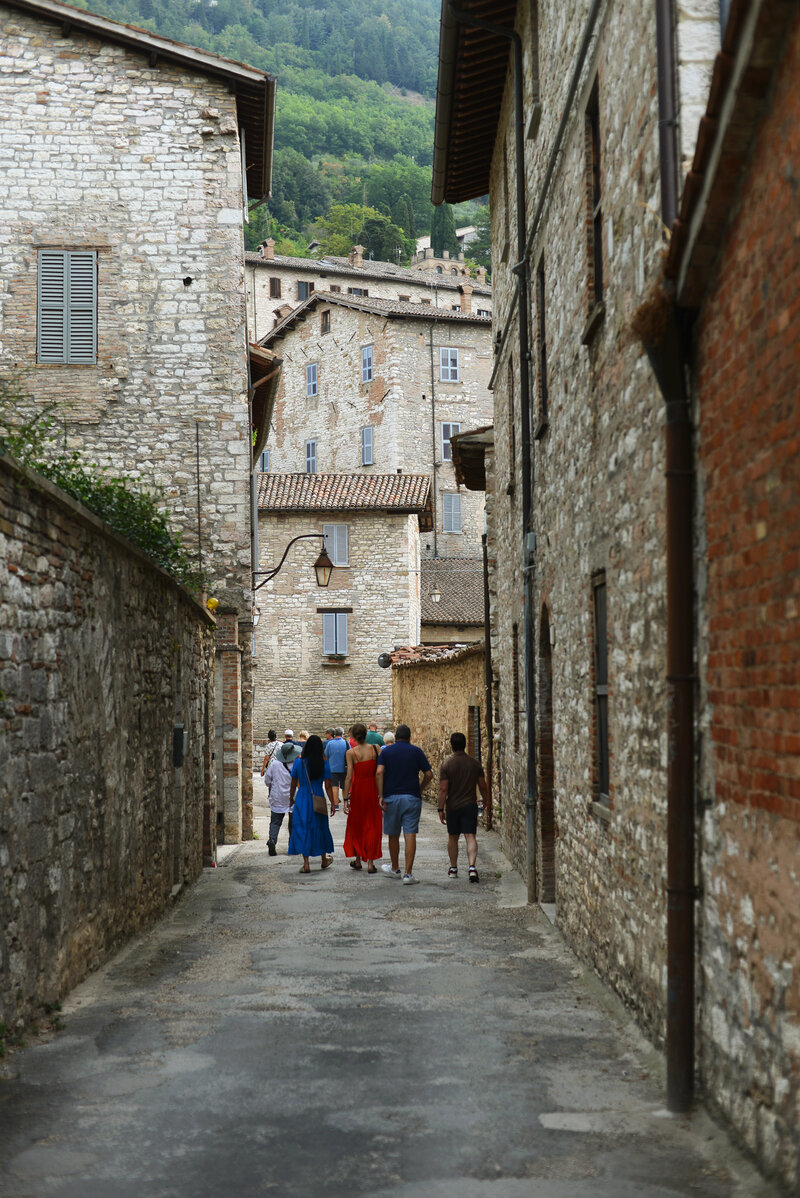 People walking through old off the beaten path on the Italy Uncorked wine tour from The Italian on Tour