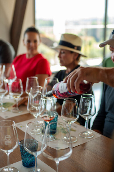 People enjoying a wine tasting during a small group trip from The Italian on Tour