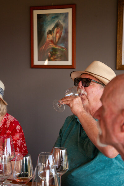 A man drinks an Italian beer On the Italian on Tour’s 10 day Epicurean Journey trip through Italy