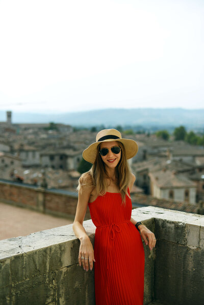 Chantelle, The Italian on Tour co-founder, and Italy local posing in Italy