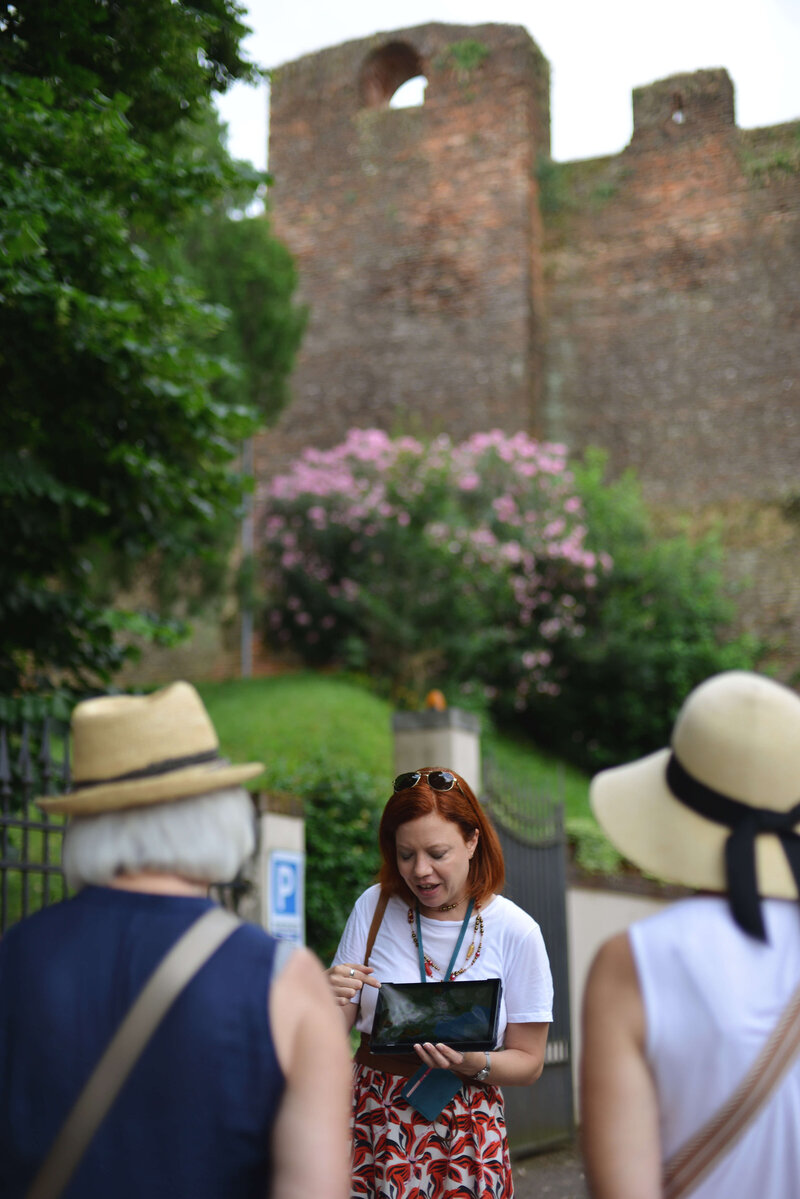 A local expert leading a tour On the Italian on Tour’s 10 day Northern Italian Delights Food & Wine Tour